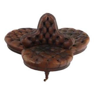 Circa 1900 French Tufted Leather Lobby Conversation Sofa For Sale