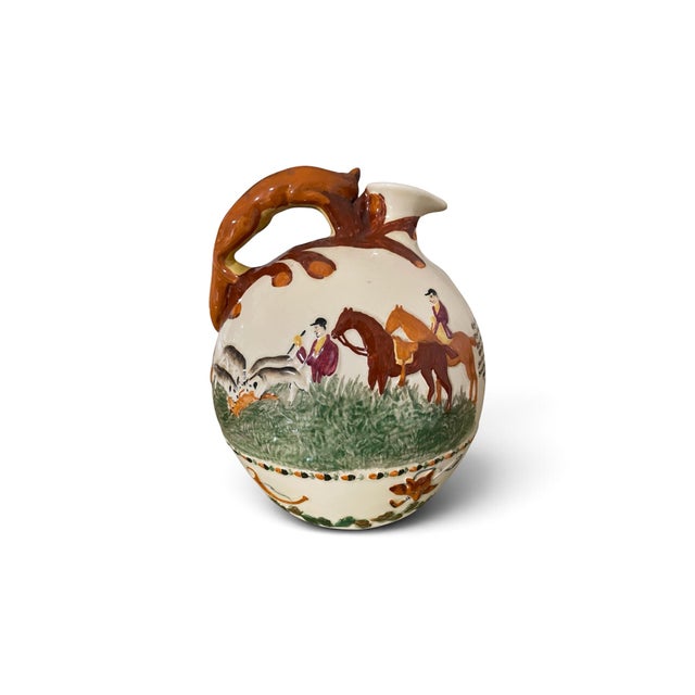 Antique ceramic John Peel musical jug. This hand painted whimsical jug by S. Fielding features a relief-molded fox hunting...