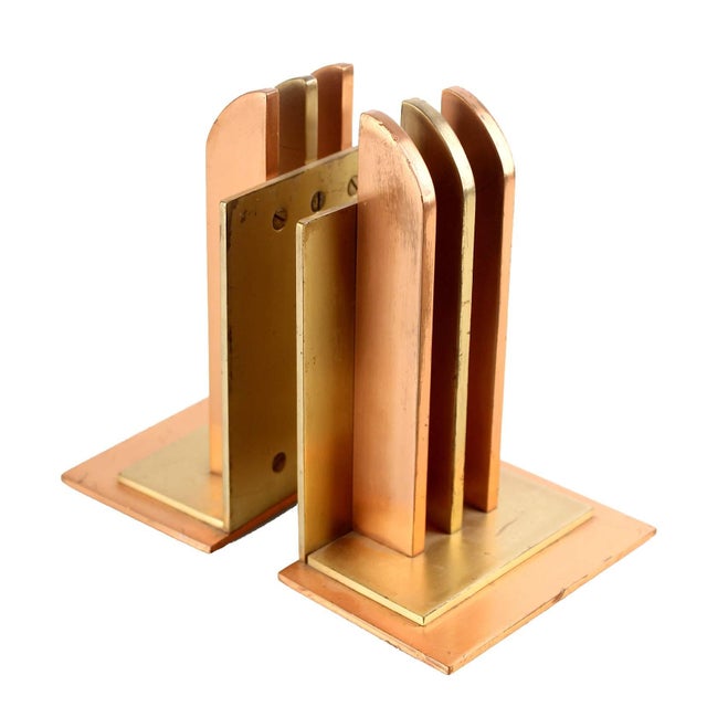 Very rare pair of machine age bookends by Chase Copper and Brass Company, Design by Walter van Nessen, solid brass and...