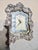 Baroque-style CYMA table Alarm clock ( working), with daily wind-up. Sterling face and silver-plated back of case. Working...