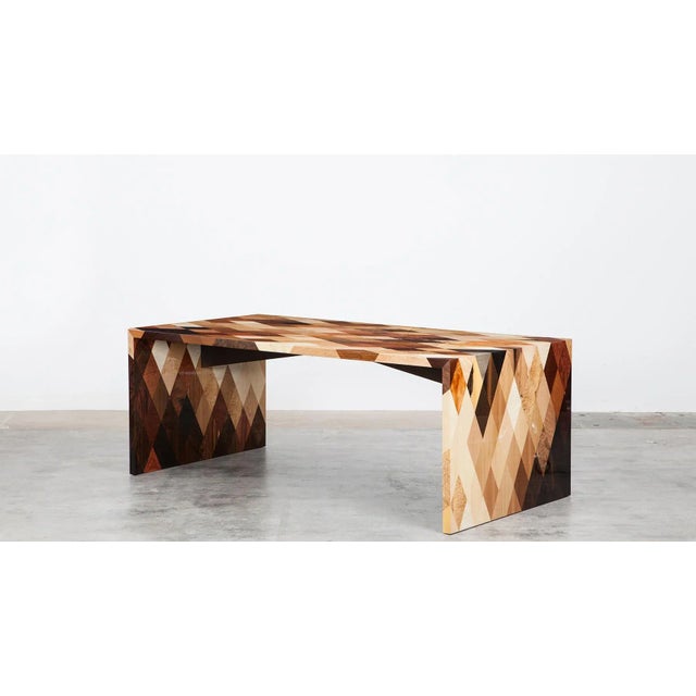 Generous desk of German contemporary artist John Hock, veneered table top in a diamond pattern, thirty species of wood....