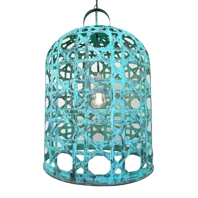 Open cane style weaved copper bell shaped lantern. Beautiful verdigris patina. This unique, handmade lantern will add...
