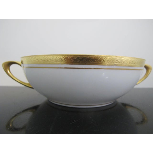 Beautiful Royal Bavarian Selb Hutschenreuther bone China soup or cream cup and underplate. Gold encrusted leaves accent...