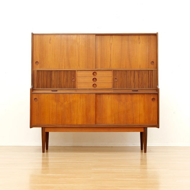 Scandinavian teak hutch credenza designed by Johannes Andersen for the Danish manufacturer Uldum Møbelfabrik. A large,...