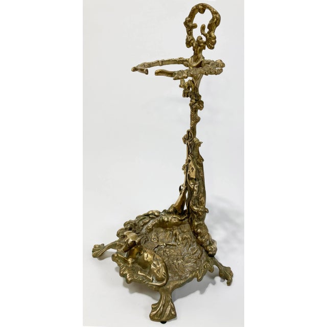 Antique late 19th C French cast brass fireplace tool holder. The holder is solid brass and depicts a charming Art Nouveau...
