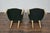 A pair of French Midcentury armchairs with natural tapering legs and custom linen upholstery. This pair of French...