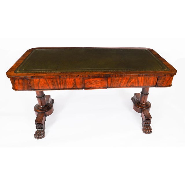 A beautiful antique William IV Gonçalo Alves, writing table, circa 1830 in date. The rectangular top features an inset...