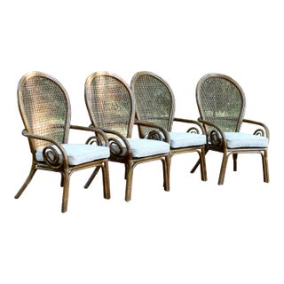 1970s Set of 4 Rattan Dining Chairs With Scroll Arms For Sale