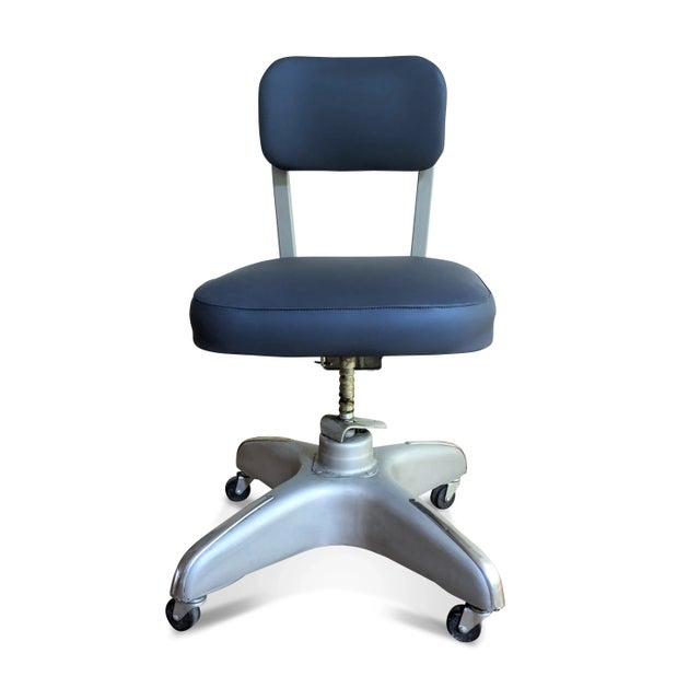 A mid-century custom tanker desk chair from the 1960s from Cole Steel. The restored office chair has been revitalized...