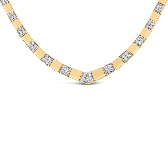 Discover the epitome of elegance with this 14K yellow gold necklace, masterfully crafted to grace your neckline with...