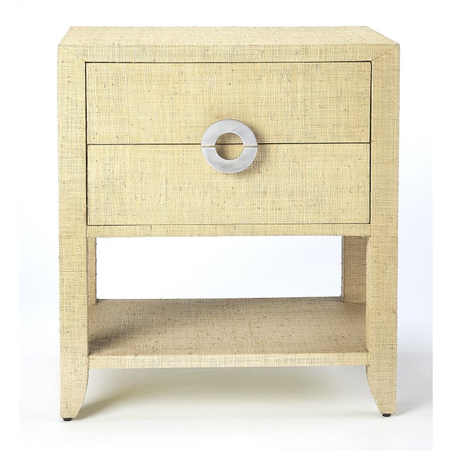 Bring a little of the outdoors in with this raffia-clad nightstand or end table. Providing convenient storage and great...