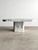 Cool to the touch and softly luminous, this postmodern Italian marble squared coffee table brings a sense of calm geometry...