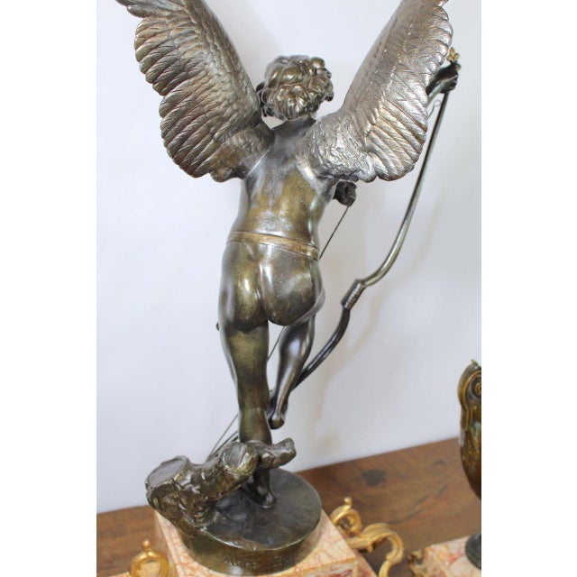 Metal Antique French 1896 “Amour Irresistible” Angel Statue Pink Marble 3-Piece Clock Set For Sale - Image 7 of 17