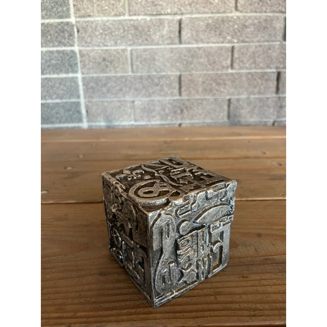 Decorative 1970s MCM cube sculpture in aluminum adorned with text, lettering and graphic design by artist Sheldon Rose.