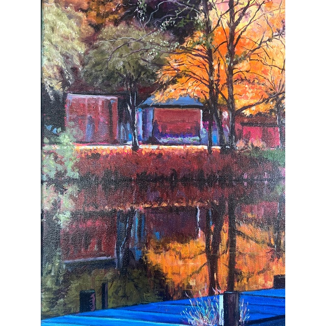 Original oil painting by Steve Schaaf. This captivating autumn landscape features a peaceful lakeside with a blue rowboat...