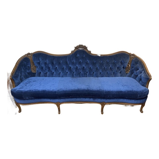 Antique Victorian Tufted Blue Velvet Sofa With Carved Wood Crest For Sale