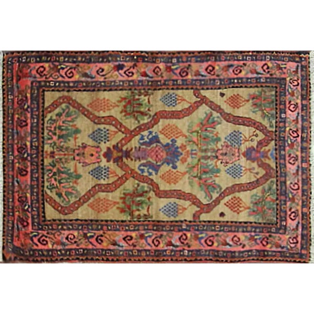 This charming late 19th-century Kurdish rug is an exceptionally attractive and collectible example distinguished by its...
