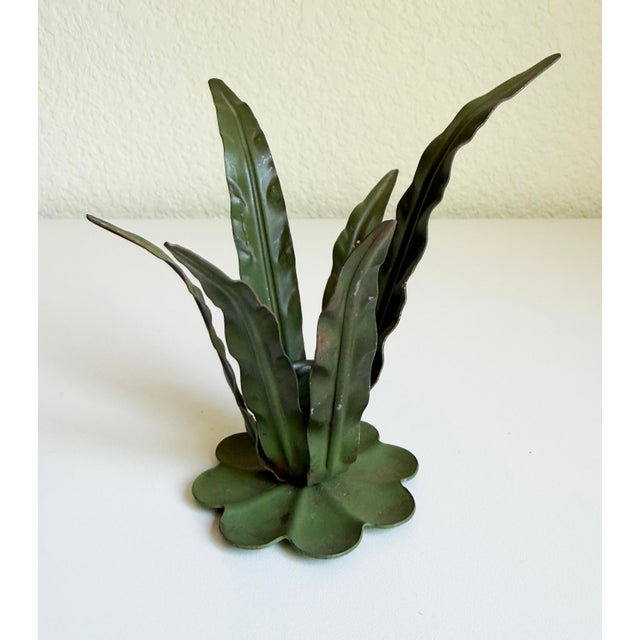 A wonderful pair of vintage Italian Florentine-style toleware metal candle holders featuring a botanical, leafy plant...