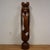 This one of a kind, life size, sculptural statue was carved out of a teak log and boasts its rich dark patina honey toned...