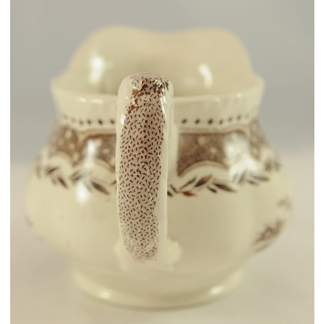 Brown and cream Antique transferware 7 inches wide, 5 inches tall