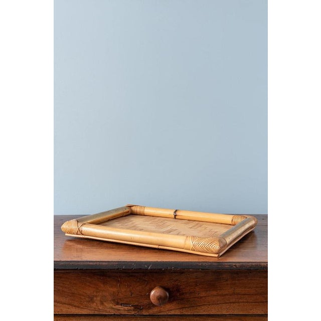 Attributed to Vivai del Sud, Italy, 1970s, this large tray features a woven bamboo surface arranged in a herringbone...