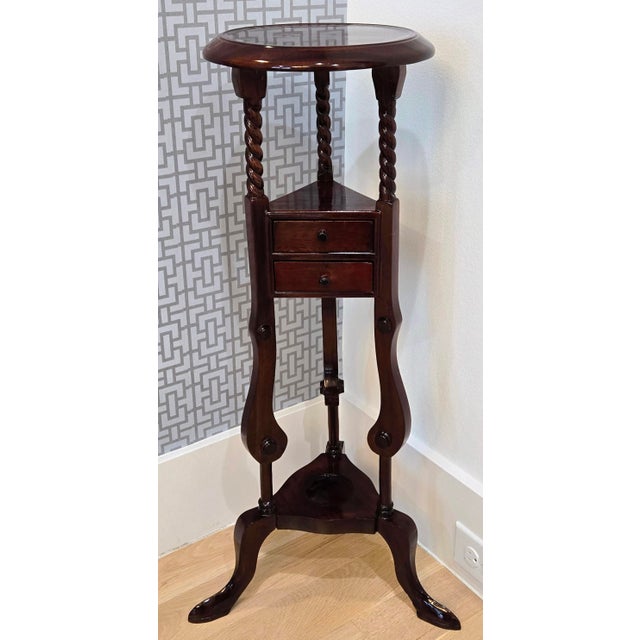 Elevate a traditional, English-inspired interior with this handsome Georgian-style mahogany stand, distinguished by three...