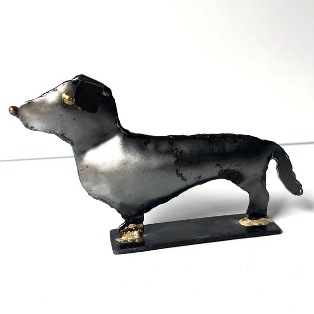 A charmingly weird brutalist steel sculpture of a dachshund. Sourced from Nice, France.