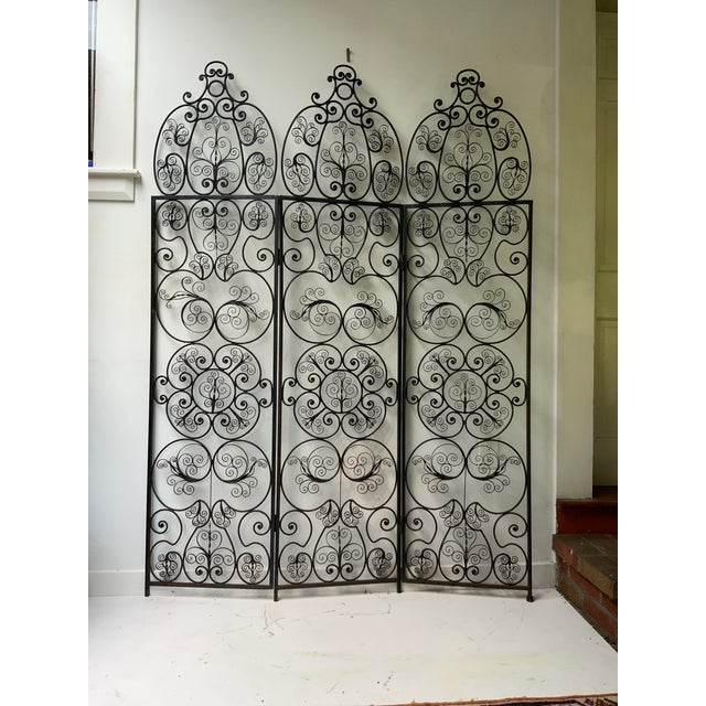 3 Part Moorish Style Folding Screen. Cast and Hand Crafted and Forged Iron Screen. Spanish Early 20th Century. Previously...