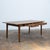 Solid fir farmhouse table, mounted on a two-legged base connected by a central stretcher. Two drawers in the front....