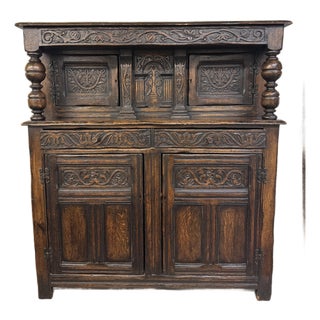 Late 19th Century Jacobean Style Carved Cupboard For Sale