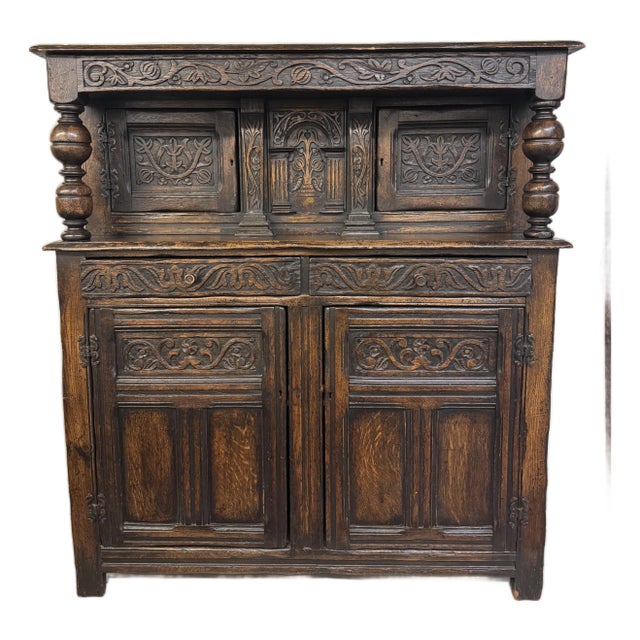 Late 19th Century Jacobean Style Carved Cupboard For Sale