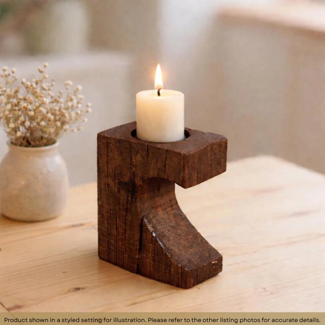 Dimensions: 5" W x 3" D x 7" H Aged wood with natural crevices has been used to craft these rustic candle holders.