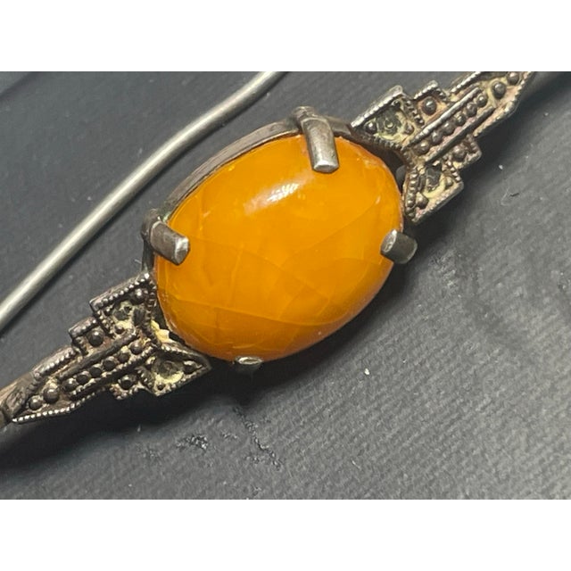 Baltic amber, particularly the prized butterscotch variety, has been treasured for thousands of years for its warm golden-...
