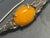Baltic amber, particularly the prized butterscotch variety, has been treasured for thousands of years for its warm golden-...
