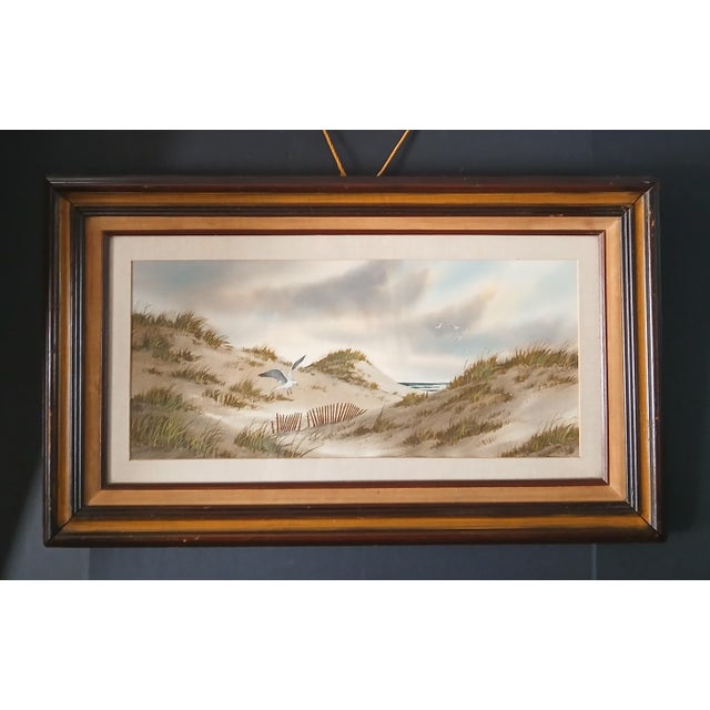 Wonderful pair of coastal sand watercolors by acclaimed artist Dorise Olson. Each approximately 21 x 9 1/2" (sight) matted...