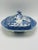 This charming antique blue and white transferware covered dish features the beloved Willow pattern, one of the most...