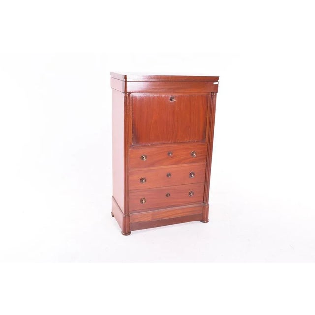 A mahogany secretaire, produced in England.