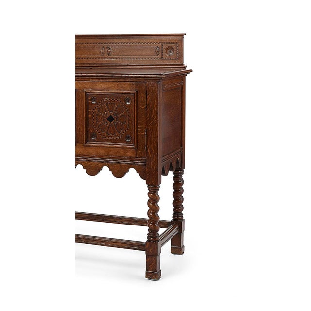 Antique hand carved English credenza/sideboard/ console/buffet. Circa 19c. Made from white oak. The piece has 2 doors and...