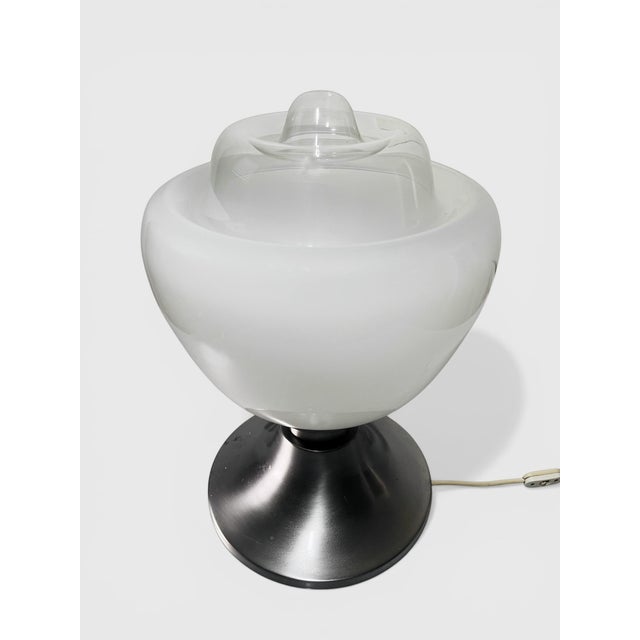 Splendid Murano Glass table lamp on a metal base. This piece is designed in the style of the selected designer and/or...
