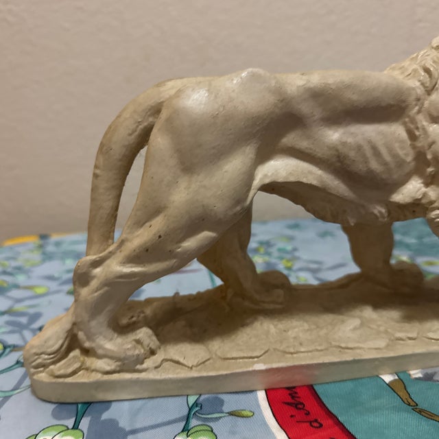 Introduce a majestic focal point to your mantle or library shelving with this stunning mid-century composite striding lion...