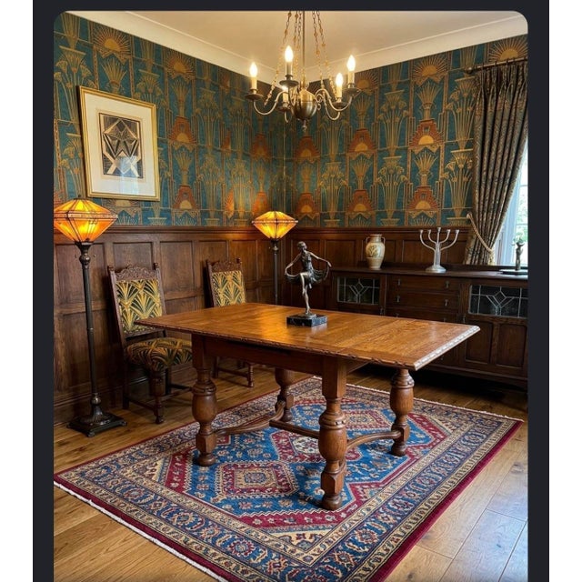 1930s Rare 1925 Jacobean-Elizabethan Solid Oak Draw-Leaf Dining Set – Hand-Carved Masterpiece For Sale - Image 5 of 12