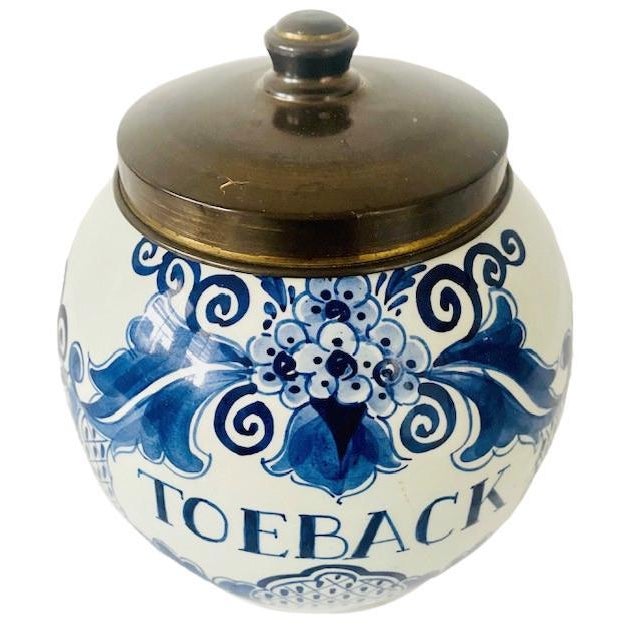 Beautiful hand -painted Delft Blue ToeBack Pot from Ceramics Factory Velsen in Sassenheim with the original brass lid....