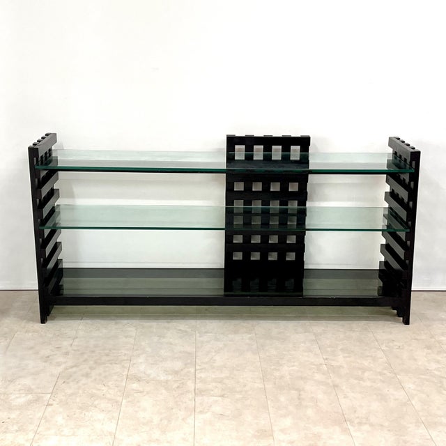 Rare and eccentric modular bookcase/console table designed by Gil and Xavier David in 1972 in France. This sculptural...