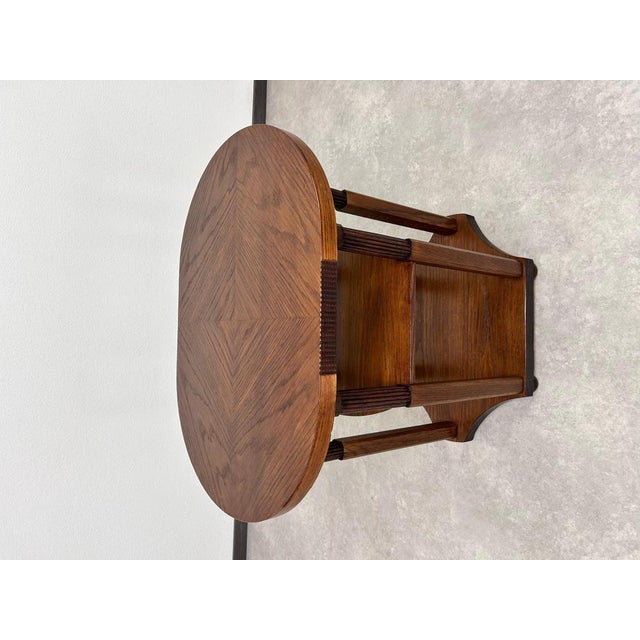 Oval side table with six legs in the style of Vienna secession. Professionally stained and repolished.