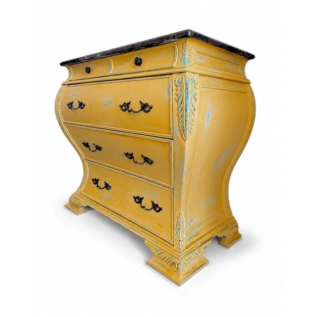 A gallery-level French Provincial bombe dresser, restored in Maison Martine’s Naples atelier. The finish blends couture...