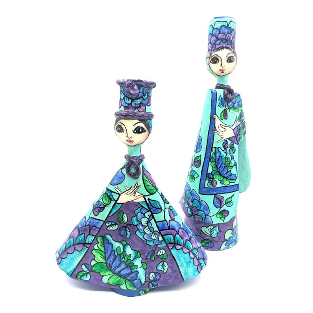 Offered are two papier mâché candle holder created and signed by Abelardo and Hector Ruiz and made in Mexico, circa. the...