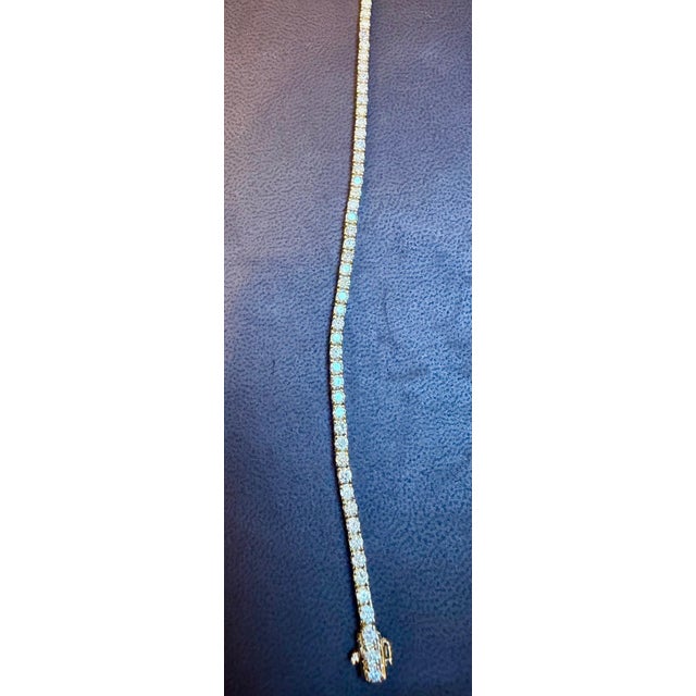 Meet the ultimate bold tennis bracelet. The single row of prong set Round Brilliant cut Total Diamond weighs Approximately...