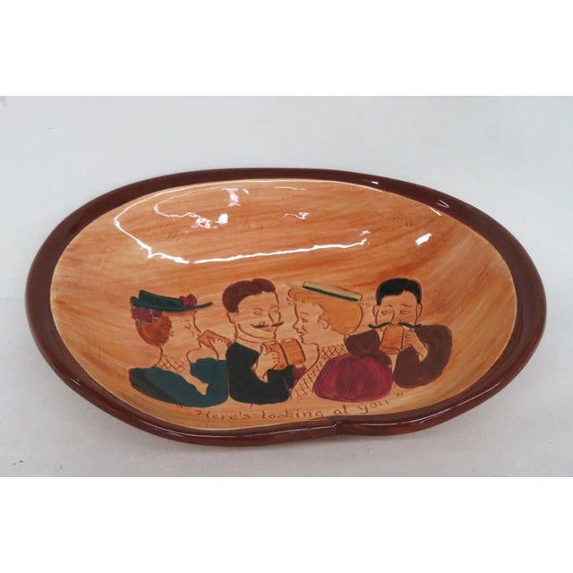 This lovely bowl is made of porcelain, and it is signed on the bottom as having been made by Pennsbury Pottery, see...