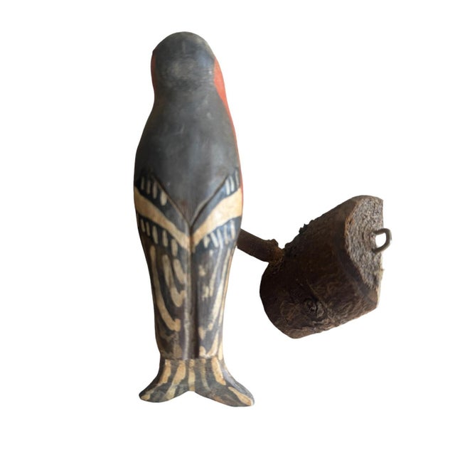 A folk art bird from Austria — hand carved wood. Measures 6" x 3.5" x 4.5". A charming folk-art carving for a shelf,...