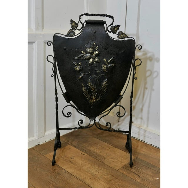 Victorian Arts and Crafts Gothic Shield Iron Fire Screen This is a Classic in the Arts and Crafts Gothic Style, it is a...